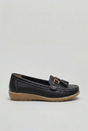 Women's slip-on tassel loafer with metal bit detail and low wedge sole