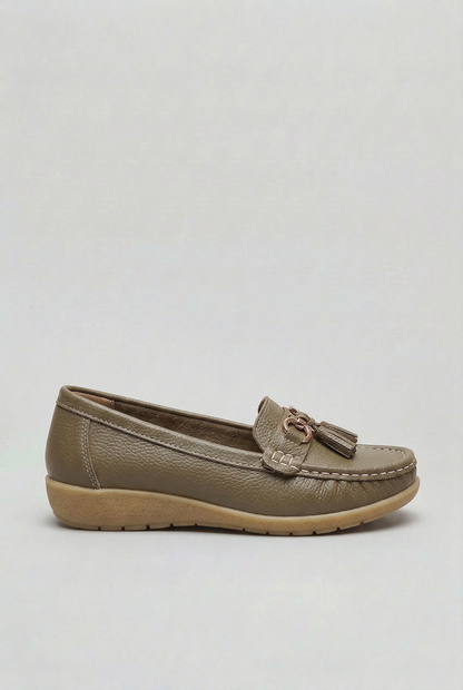 Women's slip-on tassel loafer with metal bit detail and low wedge sole