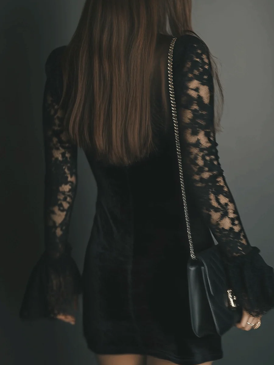 Women's black velvet mini dress with V-neckline and long lace sleeves