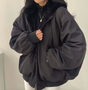 Women's lined bomber-style winter jacket with plush collar and zip front