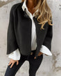 Women's cropped button-front jacket with stand collar and long sleeves