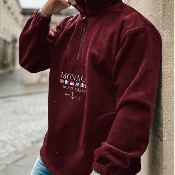 Men's quarter-zip mock neck sweater with graphic front and pouch pocket