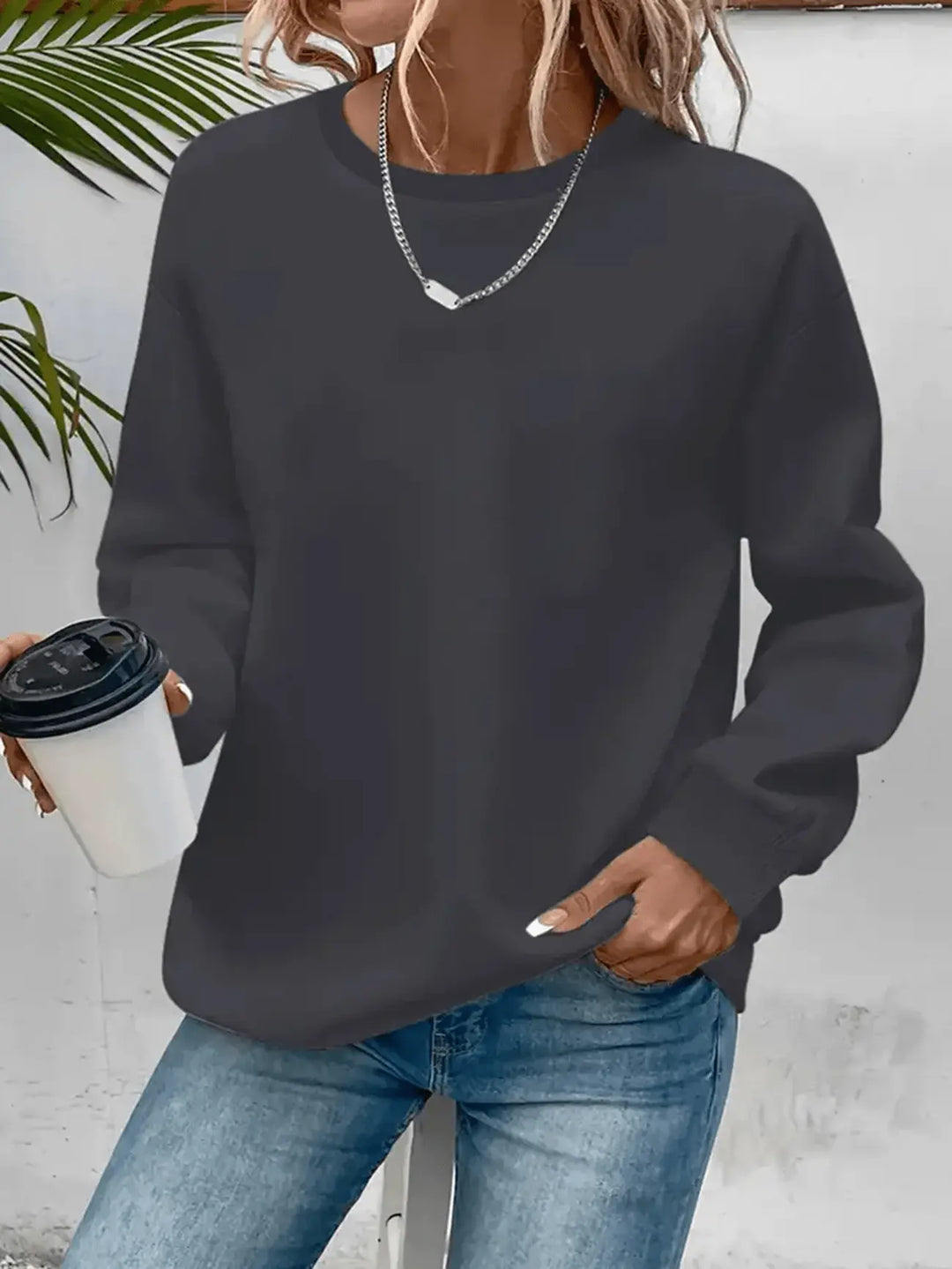 Women's long-sleeve crew neck sweatshirt with ribbed trims