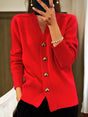 Women's V-neck knit cardigan with heart-shaped buttons and front pockets