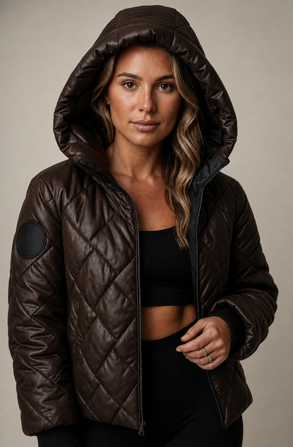 Women's quilted hooded jacket with long sleeves and zip fastening