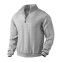 Men's cable knit quarter-zip sweater with mock neck and long sleeves