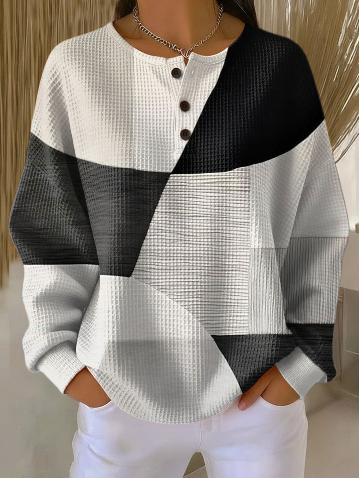 Women's geometric color block sweater with crew neck and buttons