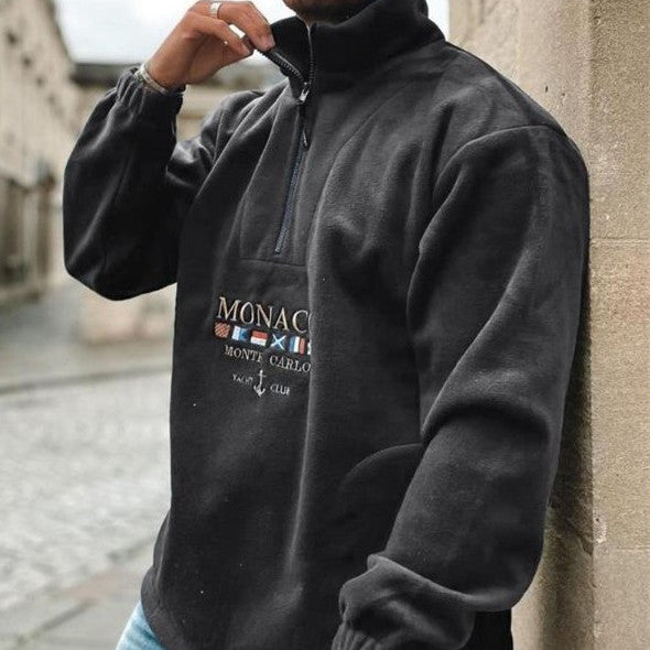 Men's quarter-zip mock neck sweater with graphic front and pouch pocket