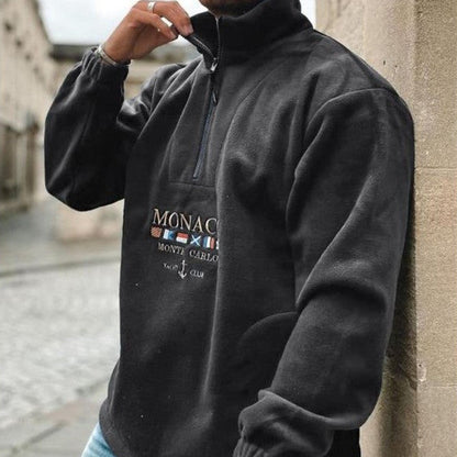 Men's quarter-zip mock neck sweater with graphic front and pouch pocket