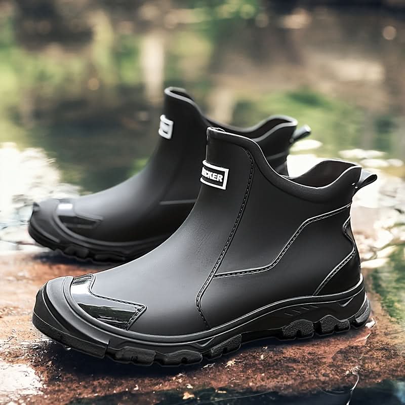 Ankle boots with pull tabs, stitched panels and lug soles