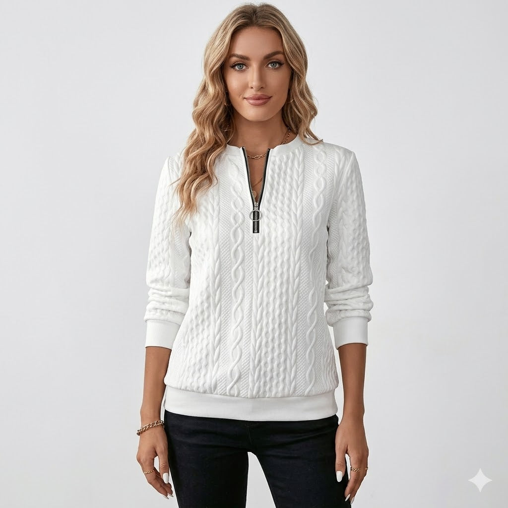 Women's cable-knit quarter-zip sweater with long sleeves and ribbed trims