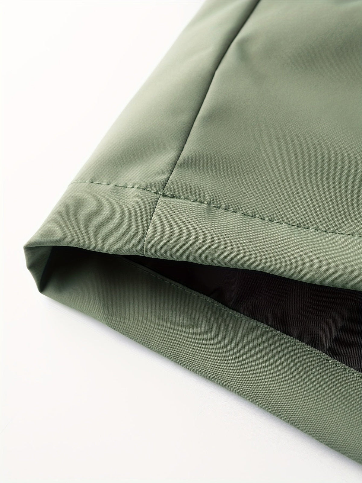 Men's black and green hooded jacket with yellow zips