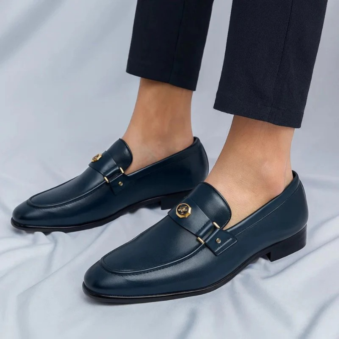 Men's slip-on loafer with decorative buckle, round toe and low heel