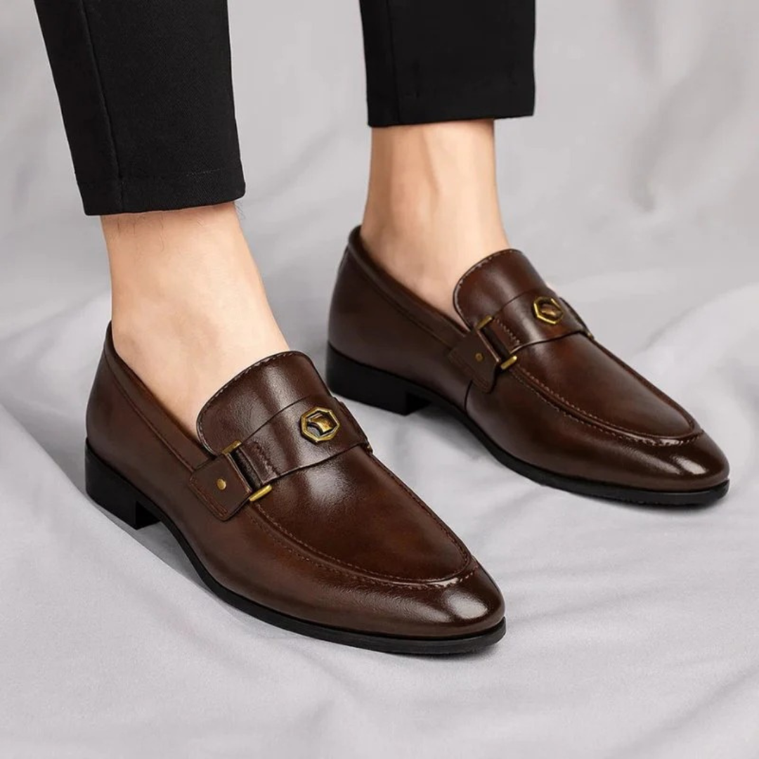 Men's slip-on loafer with decorative buckle, round toe and low heel