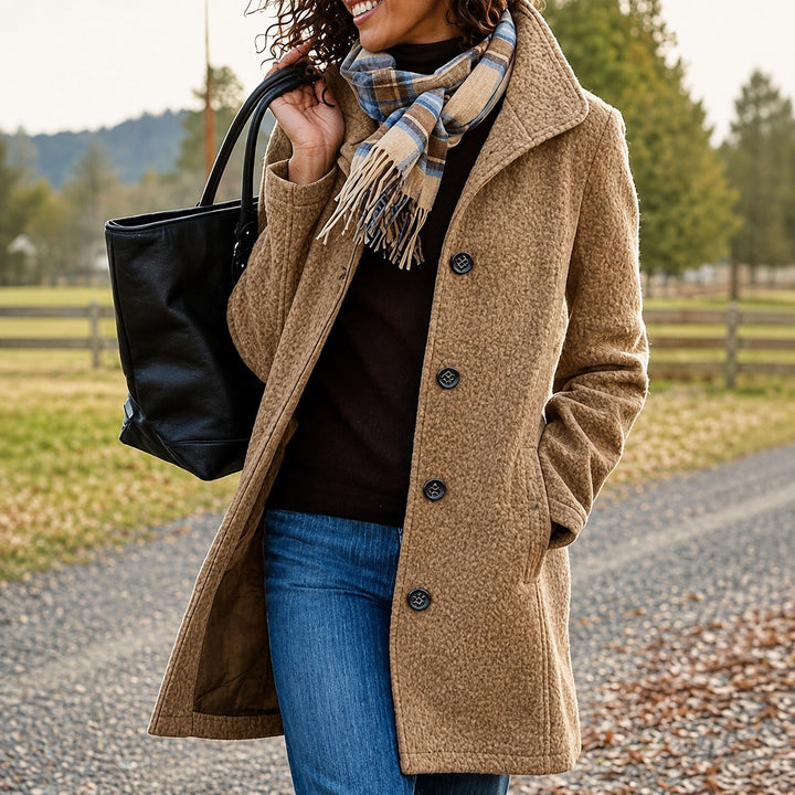 Women's textured mid-length button coat with lapel collar and side pockets