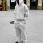 Men's hooded sweatshirt and jogger set with relaxed trousers