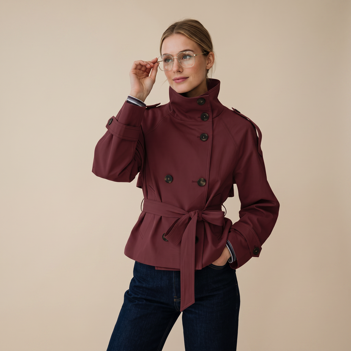 Women's belted double-breasted trench coat with high collar and long sleeves