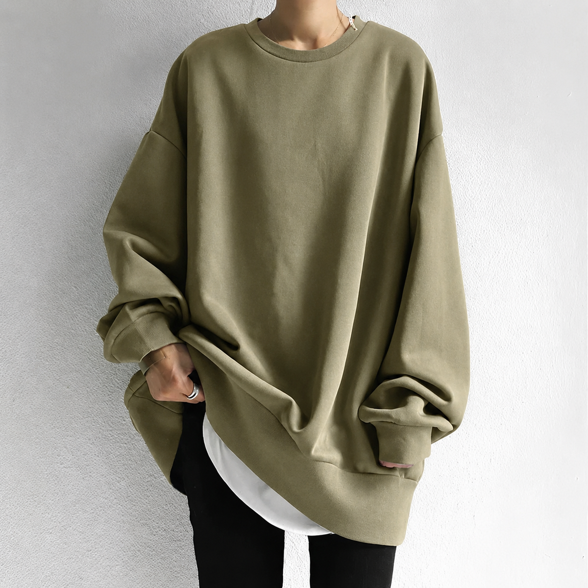 Women's oversized crew neck tunic sweater with long sleeves and ribbed trims