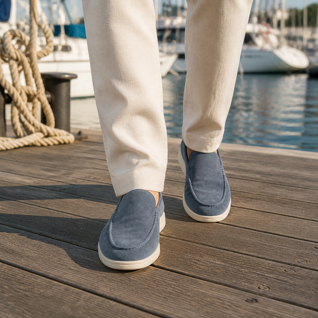 Men's rounded-toe slip-on loafers with moc-toe stitching and contrasting soles