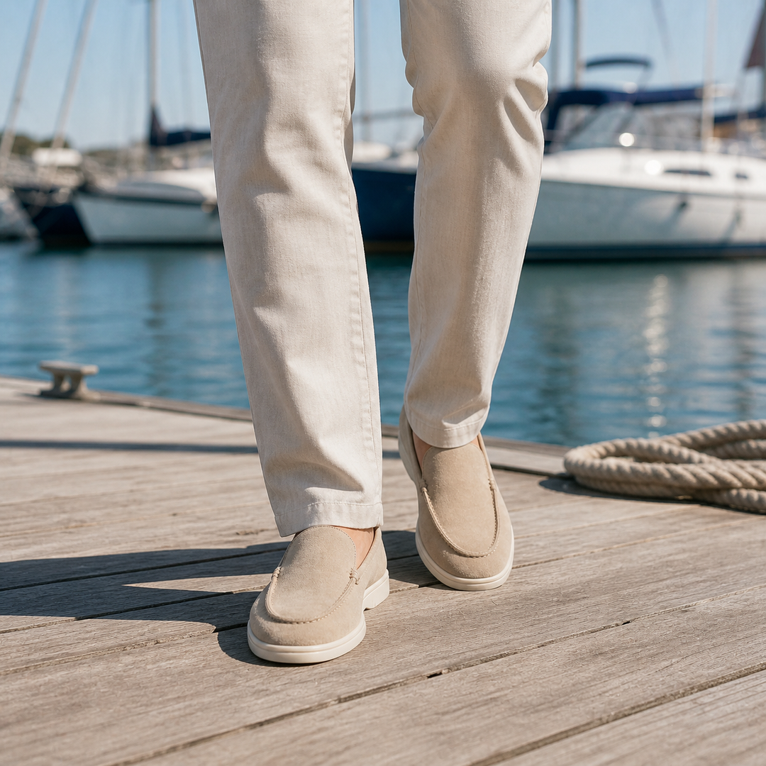 Men's rounded-toe slip-on loafers with moc-toe stitching and contrasting soles