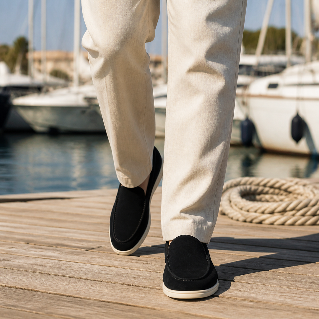 Men's rounded-toe slip-on loafers with moc-toe stitching and contrasting soles