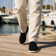 Men's rounded-toe slip-on loafers with moc-toe stitching and contrasting soles