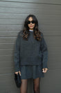 Women's long-sleeve knit sweater and short skirt set
