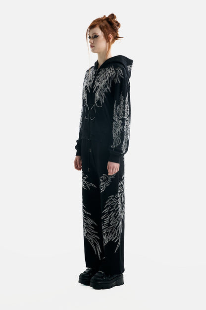 Women's black zip-up hoodie with silver rhinestone wing designs