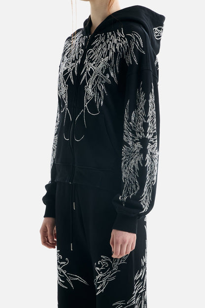 Women's black zip-up hoodie with silver rhinestone wing designs