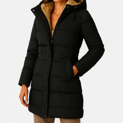 Women's hooded quilted puffer jacket with long sleeves and front pockets