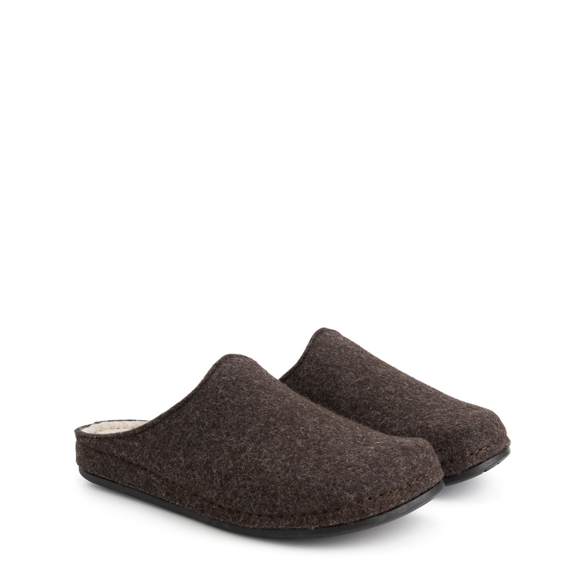 Pair of brown closed-toe house slippers with light footbeds and black flat soles