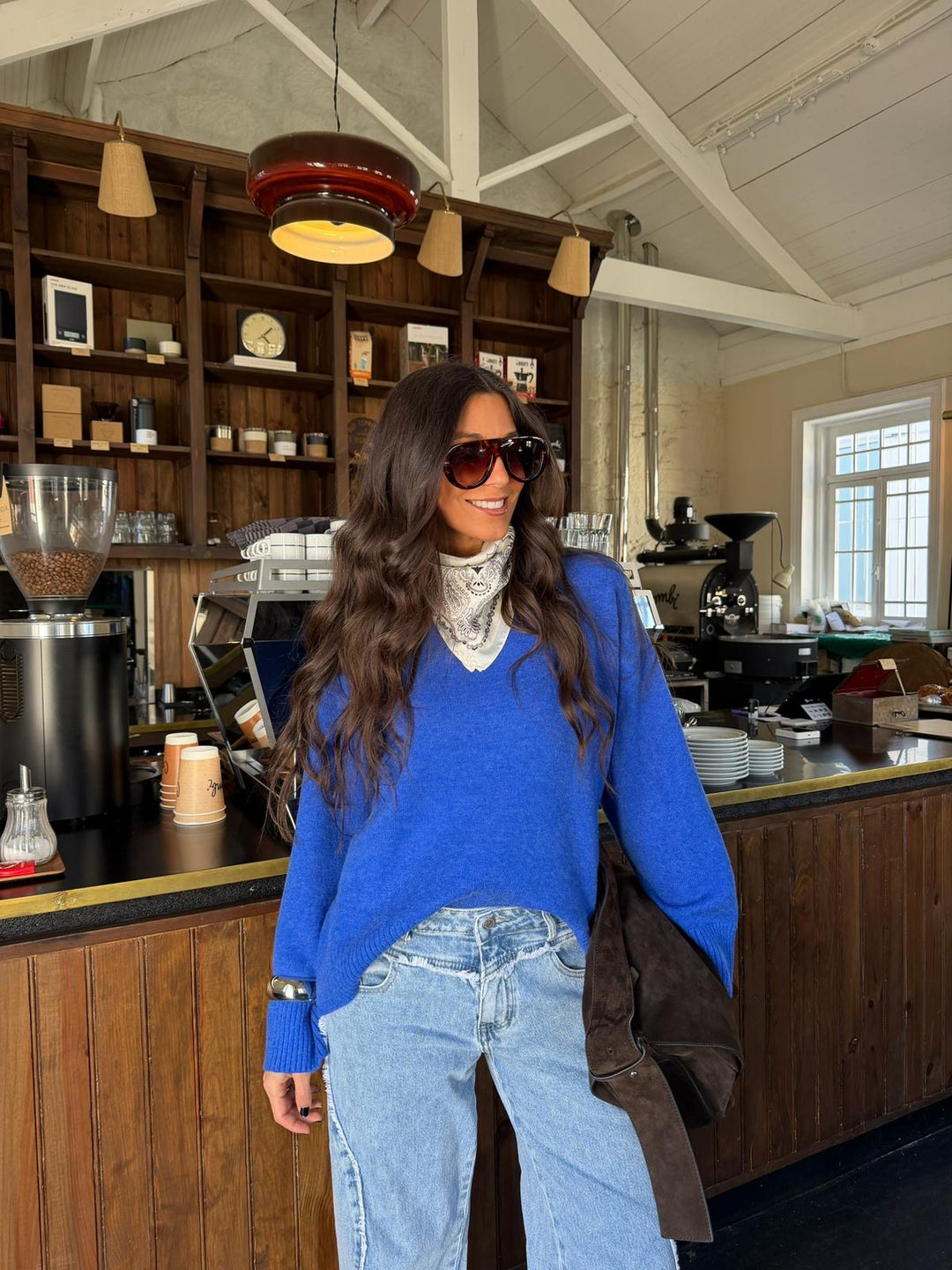 Women's oversized knit sweater with turtle neck and contrast piping