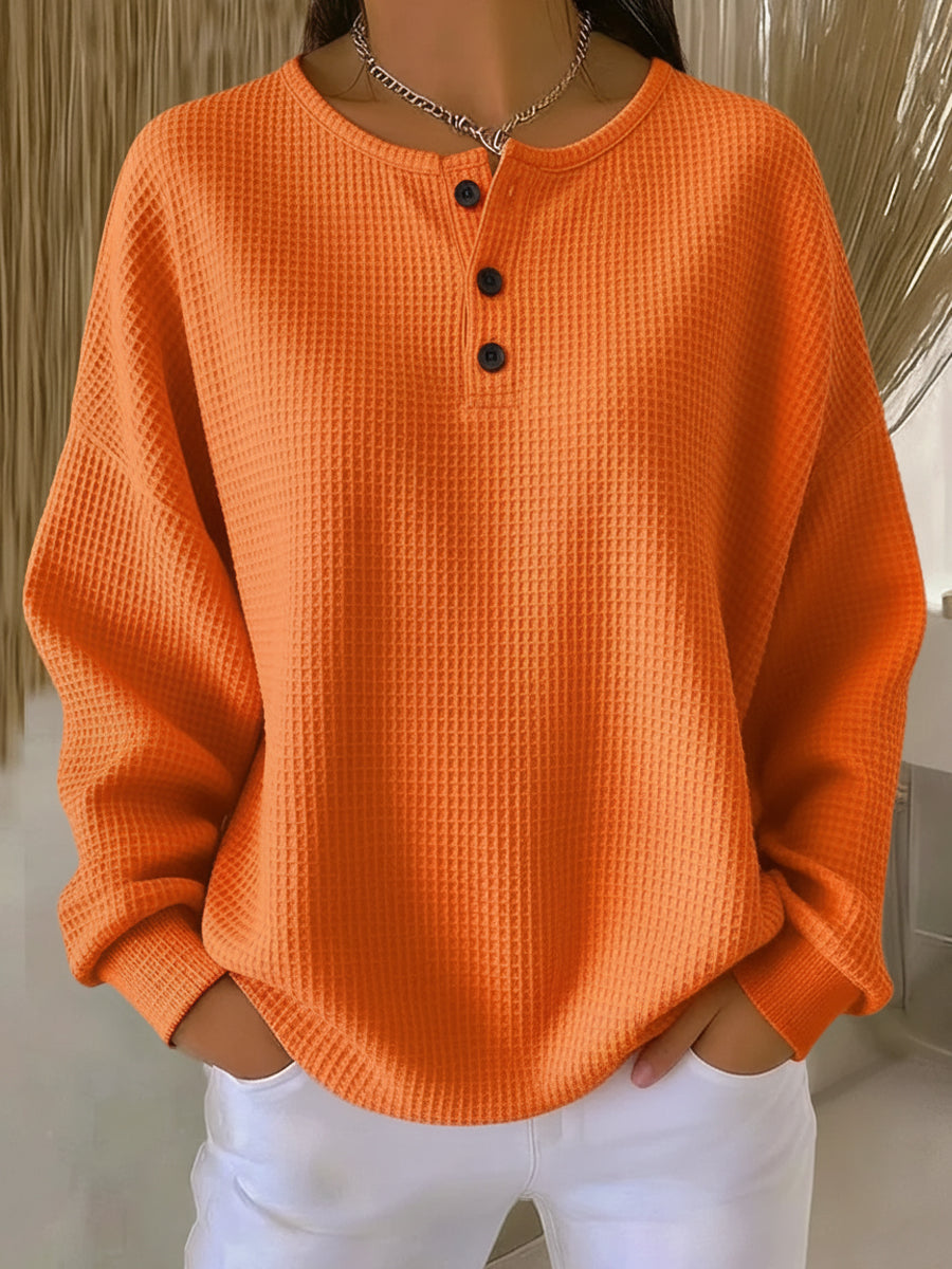 Women's long-sleeve waffle knit henley top with button placket