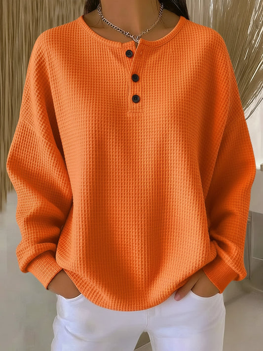 Women's long-sleeve waffle knit henley top with button placket