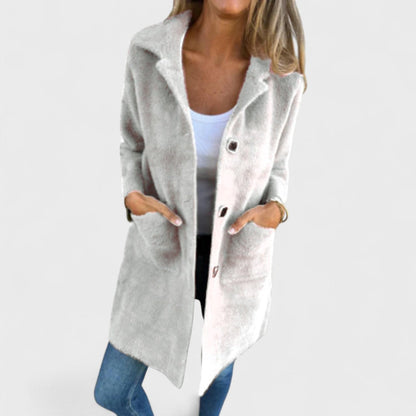 Women's longline textured coat with notched lapels, buttons and front pockets