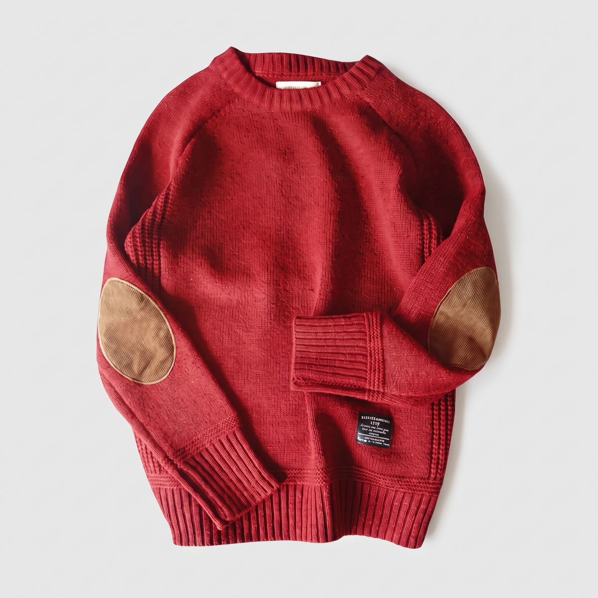 Textured crew neck knit sweater with contrasting elbow patches