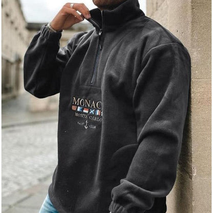 Men's quarter-zip mock neck sweater with graphic front and pouch pocket