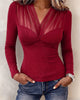 Women's long-sleeve V-neck blouse with sheer striped chest panel