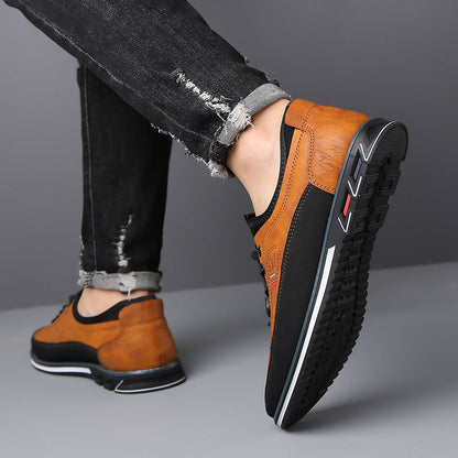 Men's Oxford-style lace-up shoes with contrast panels and flat textured soles