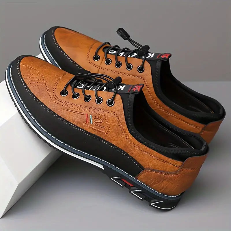 Men's Oxford-style lace-up shoes with contrast panels and flat textured soles