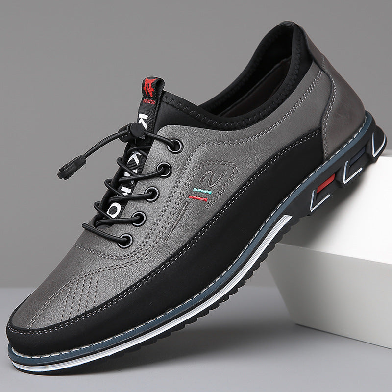 Men's Oxford-style lace-up shoes with contrast panels and flat textured soles