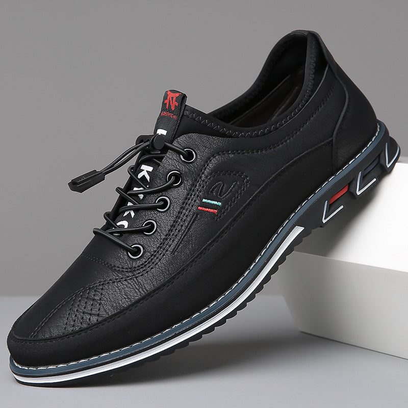 Men's Oxford-style lace-up shoes with contrast panels and flat textured soles