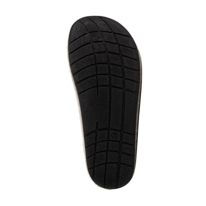 Beige open-back slip-on house slippers with rounded toes and black flat soles