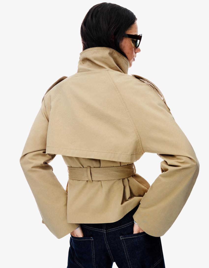 Women's cropped double-breasted jacket with stand collar, belt and long sleeves