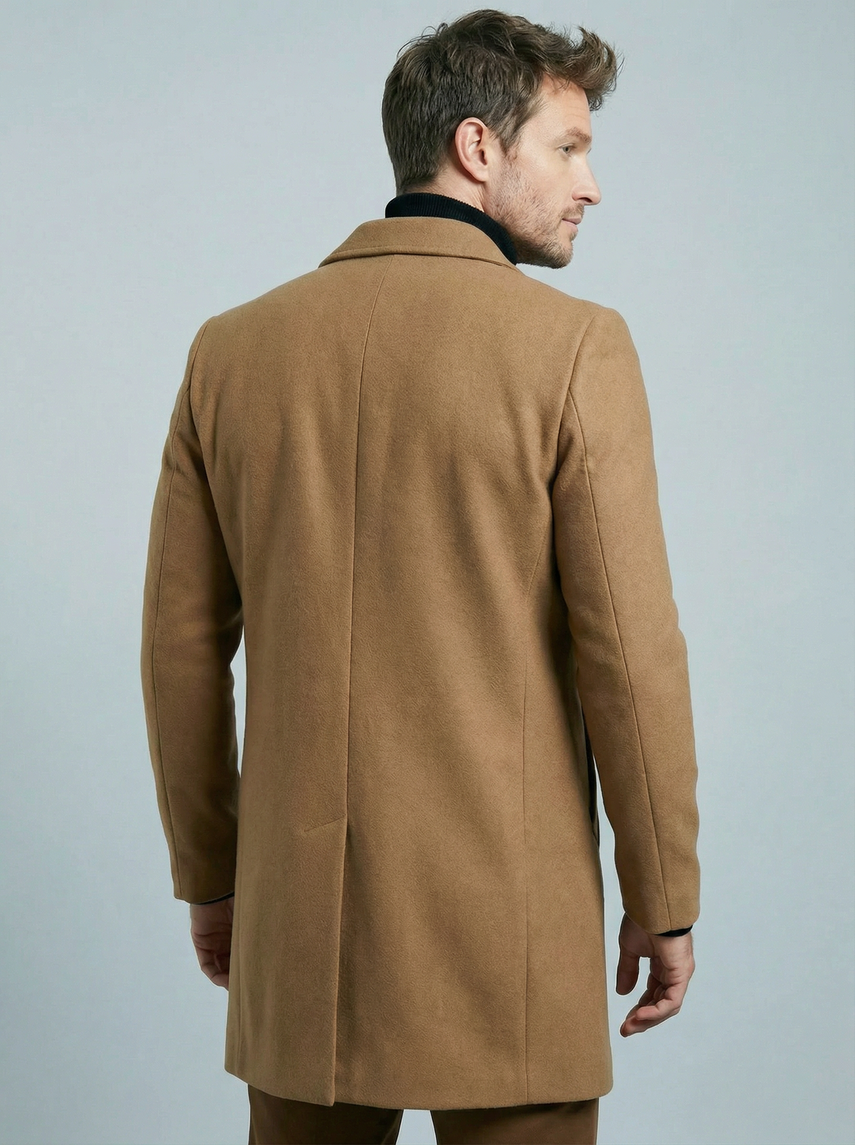 Men's structured long coat with notched lapels and button fastening