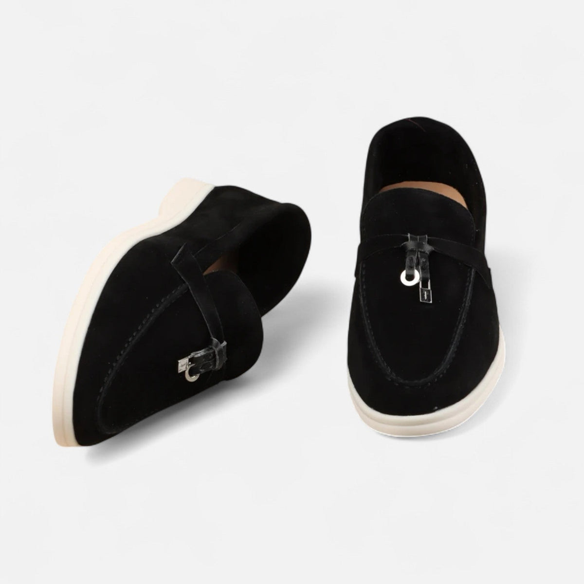 Men's textured slip-on tassel loafers with rounded toes and flat light-coloured soles