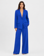 Women's brown single-breasted blazer with matching wide-leg trousers, notch lapel and patch pockets