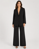 Women's brown single-breasted blazer with matching wide-leg trousers, notch lapel and patch pockets