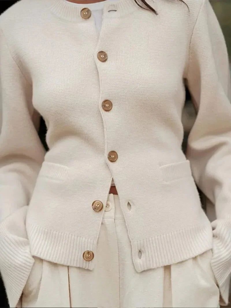 Women's beige crew neck cardigan with buttons and patch pockets