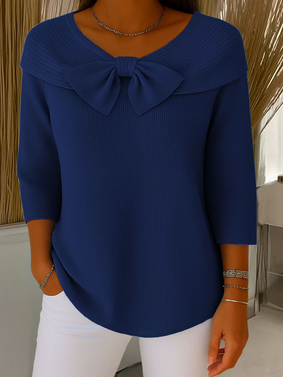 Women's ribbed sweater top with boat neckline and front bow